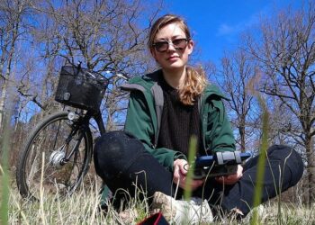 Evelina sitting on grass