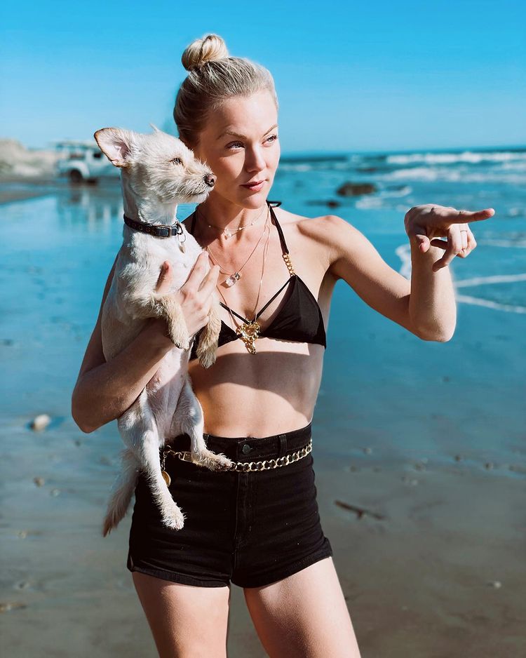 Agnes with her dog on the beach