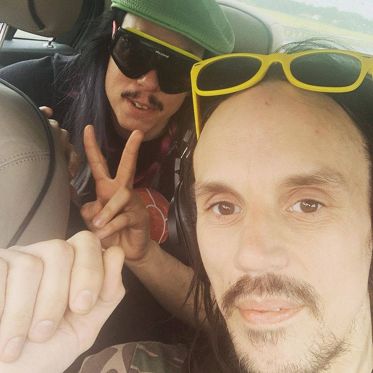 Vincent Ace in his car with friend