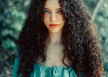 she in green dress and open hair