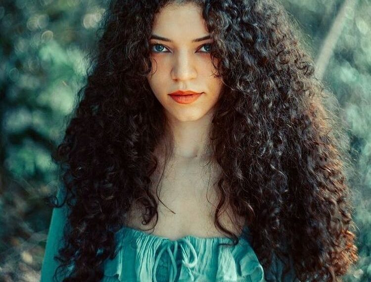 she in green dress and open hair