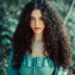 she in green dress and open hair