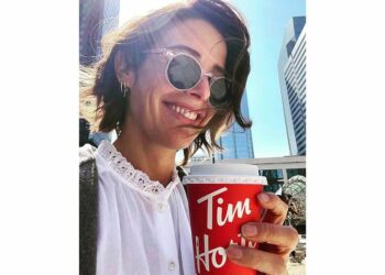 Cobie Smulders with sunglasses and coffee mug