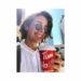 Cobie Smulders with sunglasses and coffee mug