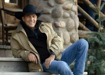 Cindy Costner's ex-husband sitting on stairs