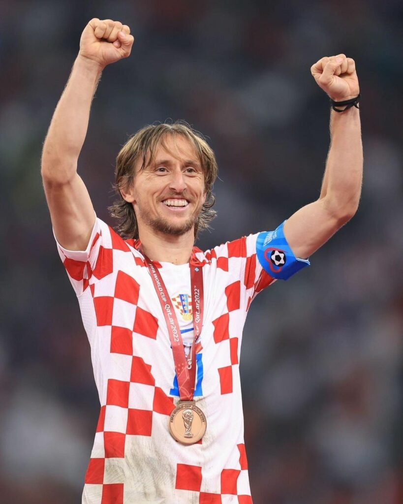 Luka with his medal on
