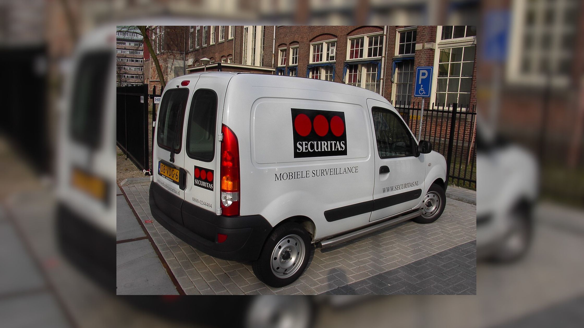 A white colored Van of the Securitas security agency.